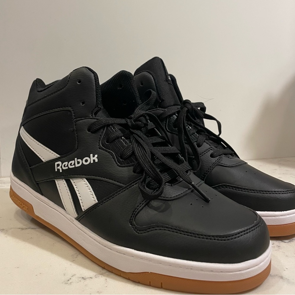 Reebok Heelys Men’s U.S. 9 black and white colored